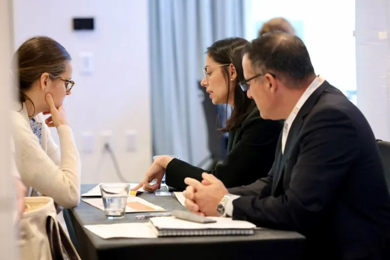 Investor reviewing a mining opportunity with company representatives